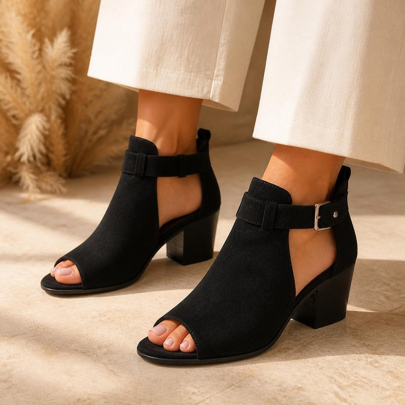Buckle Peep Toe Bootie in black, worn
