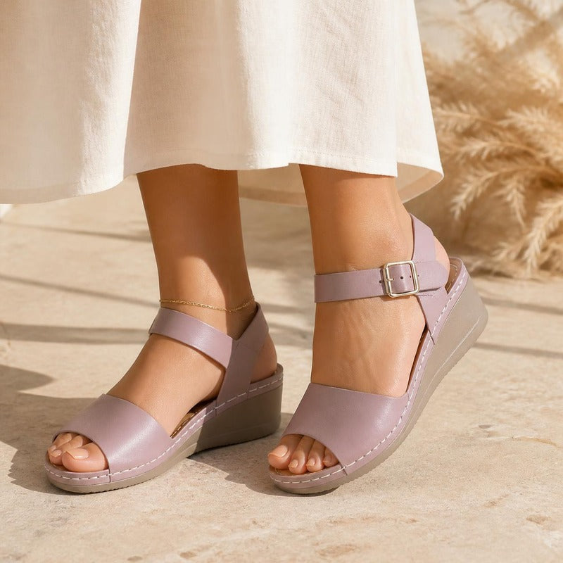 Buckle Wedge Sandal in pink, worn