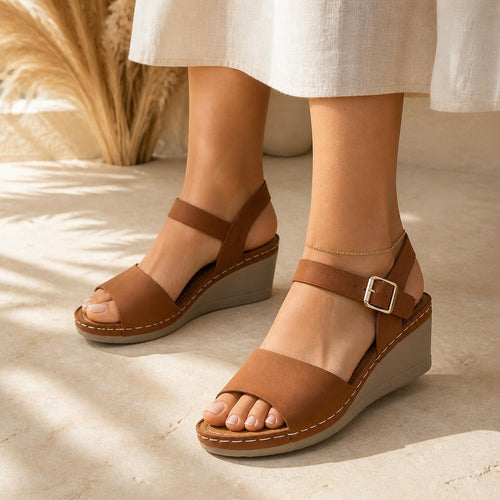 Buckle Wedge Sandal in tan, worn