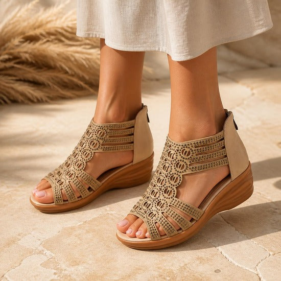 Cage Wedge Sandal in beige, worn
