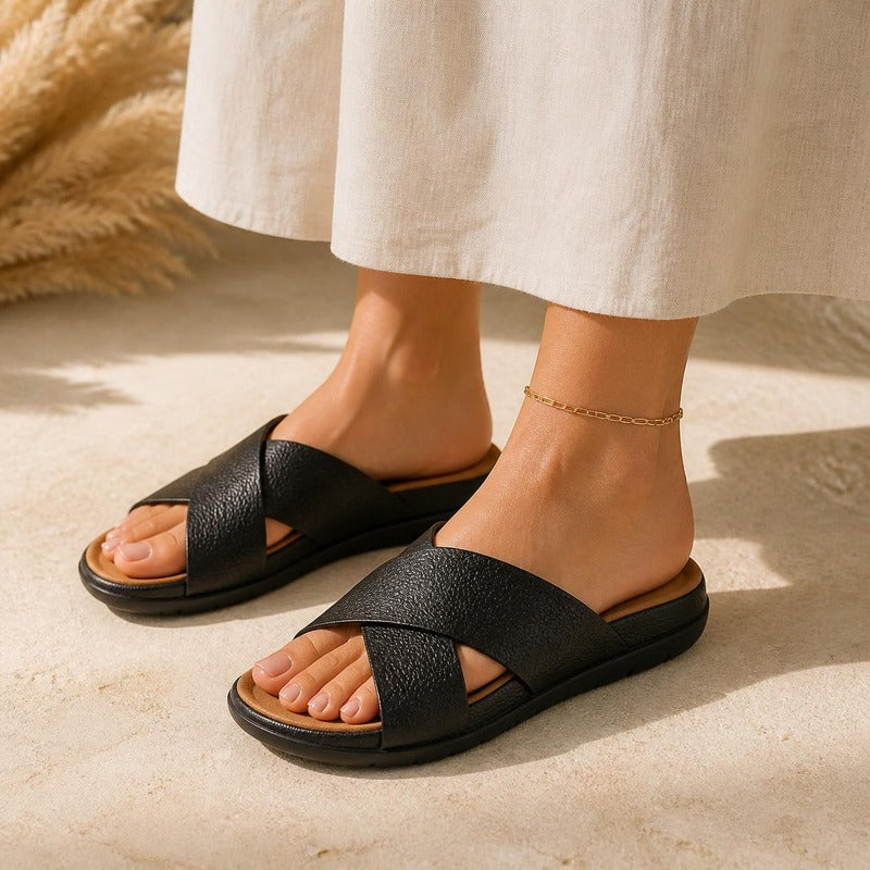 Comfy Cross Slide in black, worn