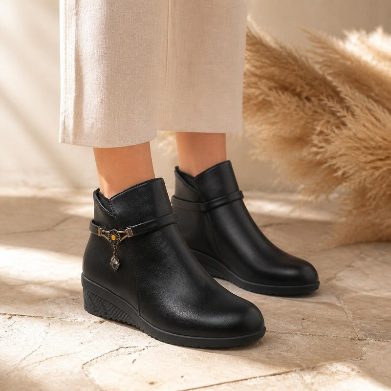 Cosy Wedge Ankle Boot in black leather, worn