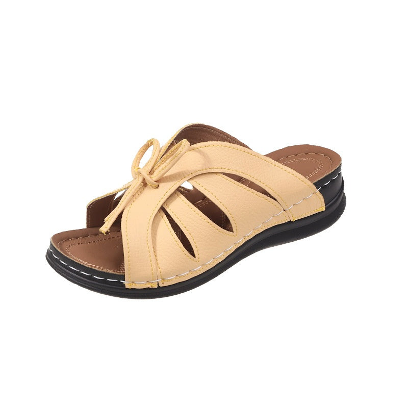 The Bow Wedge Slide in Yellow