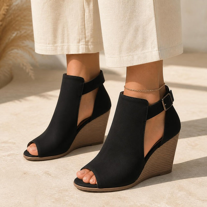 Peep Toe Wedge Bootie in black, worn