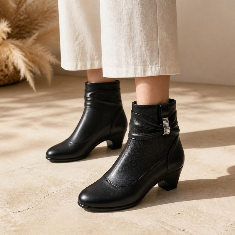 Sparkle Bow Ankle Boot in black, worn