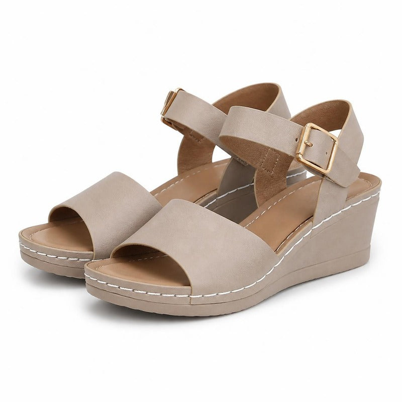 The Buckle Wedge Sandal in Taupe