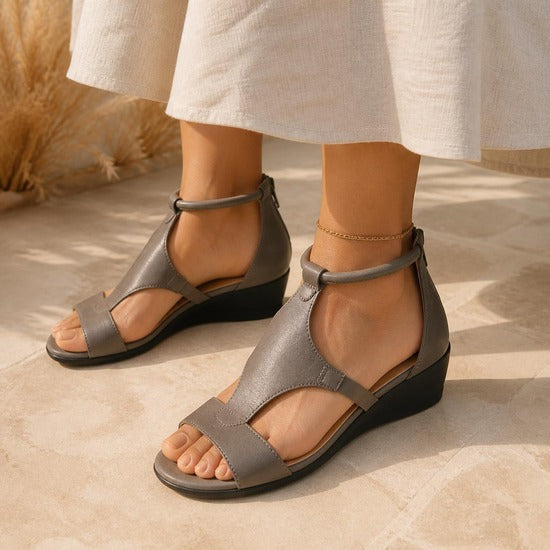 Zip-Back Wedge Sandal in grey, worn